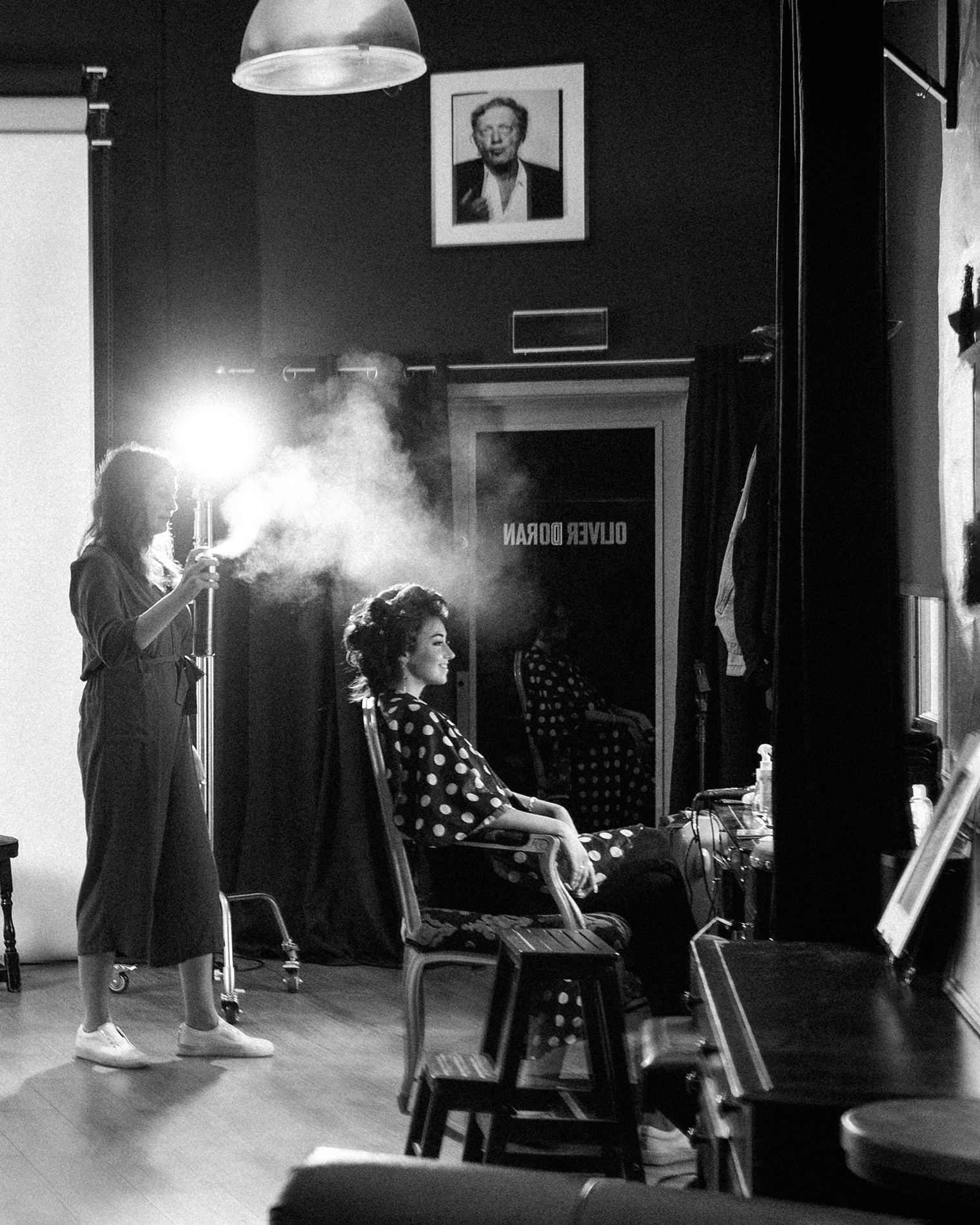 Behind the scenes: hair and makeup preparation in the portrait studio